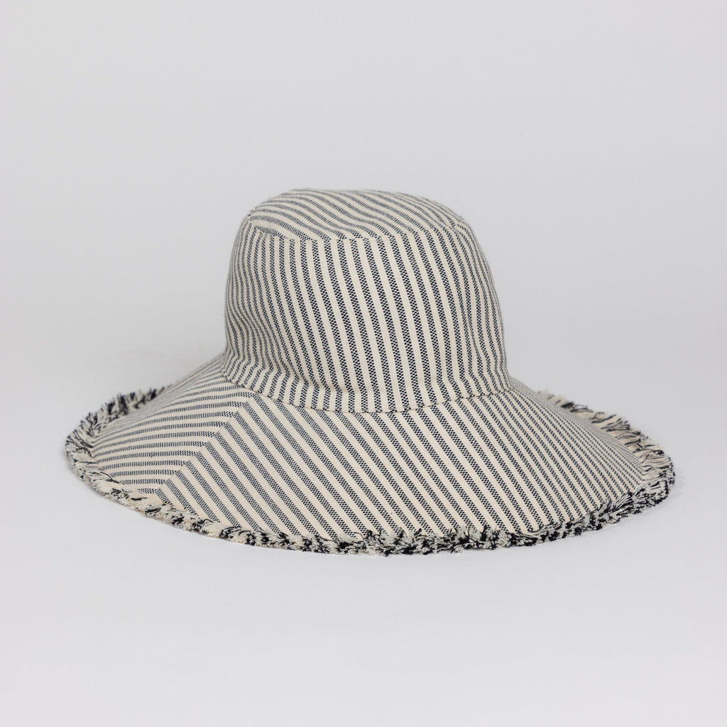 3/4 angle of Canvas Packable Bucket Hat in Black Stripe